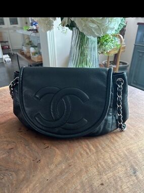 CHANEL Black Pebbled Leather CC Half-Moon Shoulder Bag with silver chain